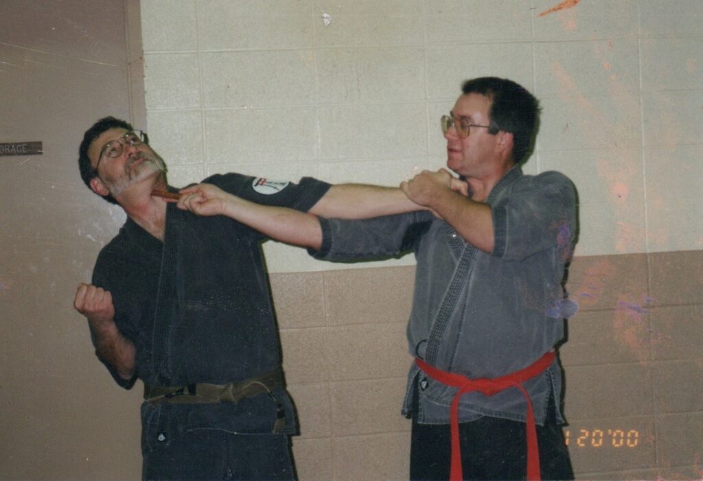 Black Belt showing use of  kubotan